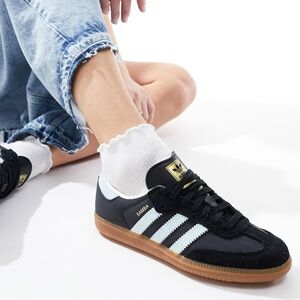 Adidas Samba OG sneakers in black and light blue